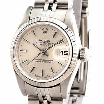 Ladies Rolex Stainless Steel Datejust 69174 with White Gold Fluted Bezel and Silver Dial (SKU L2266572NMT)