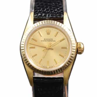 Ladies Rolex 14K Yellow Gold Oyster Perpetual 67197 Watch Champagne Dial With Papers (SKU 8900790AMT)