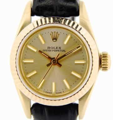 Ladies Rolex 14K Yellow Gold Oyster Perpetual Champagne  67197 (SKU 9039078NBLKCMT)
