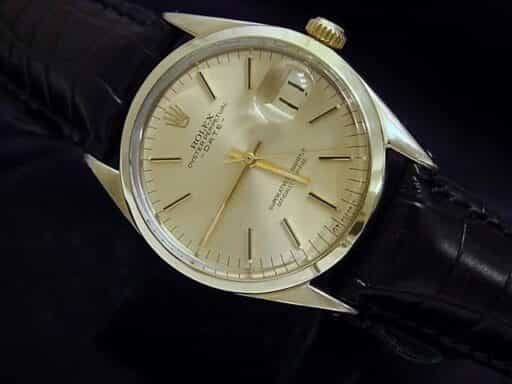 Mens Rolex 14K Gold Shell Date Champagne 1550 (SKU 1550GSBMT)