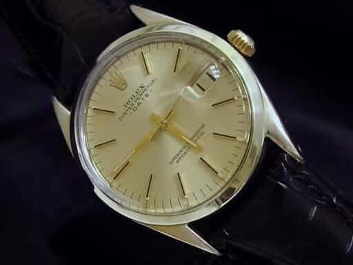 Mens Rolex 14K Gold Shell Date Champagne 1550 (SKU 1550GSBMT)