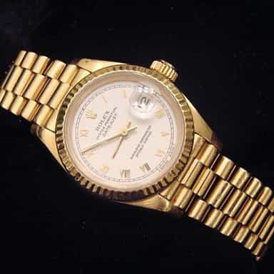 Ladies Rolex 18K Yellow Gold Datejust President White Roman 69178 (SKU 562DJMT)