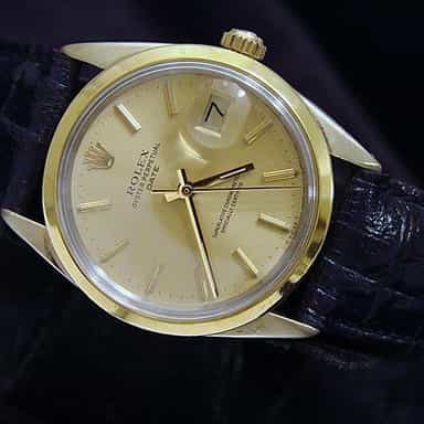 Mens Rolex 14K Gold Shell Date Champagne 1550 (SKU 6098272BMT)
