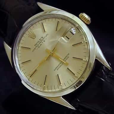 Mens Rolex 14K Gold Shell Date Champagne 1550 (SKU 1550GSBMT)