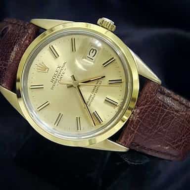 Mens Rolex 14K Gold Shell Date Champagne 1550 (SKU 8369166MT)