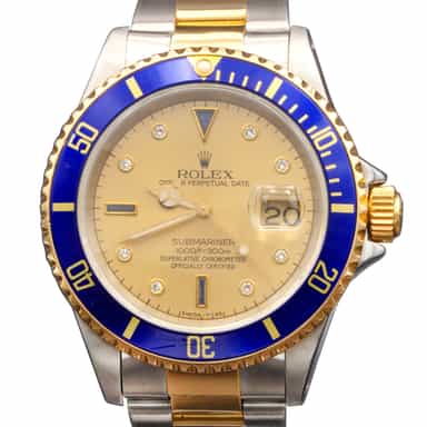 Mens Rolex Two-Tone Submariner 16613 with Gold Diamond & Blue Sapphire Serti Dial (SKU 16613DDFPAMT)