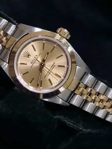 Ladies Rolex Two-Tone 18K/SS Oyster Perpetual Champagne  67183 (SKU T631699CMT)